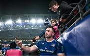 25 November 2023; Jack Conan of Leinster takes a selfie with a supporter after his side's victory in the United Rugby Championship match between Leinster and Munster at the Aviva Stadium in Dublin. Photo by Harry Murphy/Sportsfile