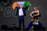 25 November 2023; Dan McCabe and Tara Howley welcome Gary Cully to the ring for his WBA Continental Europe lightweight bout against Reece Mould at the 3Arena in Dublin. Photo by Stephen McCarthy/Sportsfile