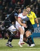 25 November 2023; Dave Shanahan of Ulster is tackled by Sintu Manjezi of Glasgow Warriors during the United Rugby Championship match between Glasgow Warriors and Ulster at Scotstoun Stadium in Glasgow, Scotland. Photo by Paul Devlin/Sportsfile