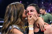 25 November 2023; Katie Taylor celebrates with her mother Bridget Taylor after defeating Chantelle Cameron in their undisputed super lightweight championship fight at the 3Arena in Dublin. Photo by Stephen McCarthy/Sportsfile