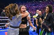 25 November 2023; Katie Taylor celebrates with mother Bridget Taylor after defeating Chantelle Cameron in their undisputed super lightweight championship fight at the 3Arena in Dublin. Photo by Stephen McCarthy/Sportsfile