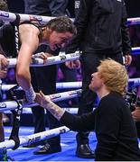 25 November 2023; Katie Taylor is congratulated by singer Ed Sheeran after defeating Chantelle Cameron in her undisputed super lightweight championship fight at the 3Arena in Dublin. Photo by Stephen McCarthy/Sportsfile