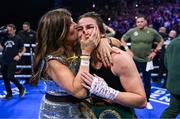 25 November 2023; Katie Taylor celebrates with her mother Bridget Taylor after defeating Chantelle Cameron in their undisputed super lightweight championship fight at the 3Arena in Dublin. Photo by Stephen McCarthy/Sportsfile