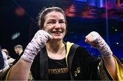 25 November 2023; Katie Taylor celebrates defeating Chantelle Cameron in their undisputed super lightweight championship fight at the 3Arena in Dublin. Photo by Stephen McCarthy/Sportsfile
