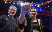 25 November 2023; Katie Taylor celebrates with manager Brian Peters after defeating Chantelle Cameron in their undisputed super lightweight championship fight at the 3Arena in Dublin. Photo by Stephen McCarthy/Sportsfile