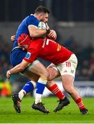 25 November 2023; Robbie Henshaw of Leinster is tackled by John Hodnett of Munster during the United Rugby Championship match between Leinster and Munster at the Aviva Stadium in Dublin. Photo by Tyler Miller/Sportsfile