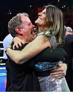 25 November 2023; Bridget Taylor, mother of Katie Taylor, and manager Brian Peters celebrate Katie Taylor's victory in the undisputed super lightweight championship fight against Chantelle Cameron at the 3Arena in Dublin. Photo by Stephen McCarthy/Sportsfile