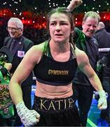 25 November 2023; Katie Taylor, and her manager Brian Peters, celebrate defeating Chantelle Cameron in their undisputed super lightweight championship fight at the 3Arena in Dublin. Photo by Stephen McCarthy/Sportsfile