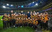 25 November 2023; The County Carlow team with Leinster players Liam Turner, Brian Deeny and John McKee before the Bank of Ireland Half-Time Minis at the United Rugby Championship match between Leinster and Munster at the Aviva Stadium in Dublin. Photo by Harry Murphy/Sportsfile