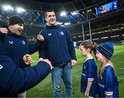 25 November 2023; Matchday mascots Eabha Hurley and Katie Murphy with Leinster players John McKee and Brian Deeny before the United Rugby Championship match between Leinster and Munster at the Aviva Stadium in Dublin. Photo by Harry Murphy/Sportsfile