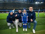 25 November 2023; Matchday mascots Katie Murphy with Leinster players Liam Turner, John McKee and Brian Deeny before the United Rugby Championship match between Leinster and Munster at the Aviva Stadium in Dublin. Photo by Harry Murphy/Sportsfile