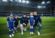 25 November 2023; Matchday mascots Katie Murphy and Eabha Hurley with Leinster players Liam Turner, John McKee and Brian Deeny before the United Rugby Championship match between Leinster and Munster at the Aviva Stadium in Dublin. Photo by Harry Murphy/Sportsfile