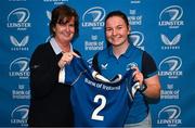 25 November 2023; Sarah Delaney is presented with her jersey by Dorothy Collins of Leinster Rugby during the Leinster Rugby Women's Cap presentation after the United Rugby Championship match between Leinster and Munster at the Aviva Stadium in Dublin. Photo by Tyler Miller/Sportsfile