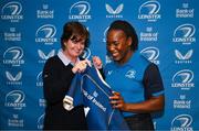 25 November 2023; Linda Djougang is presented with her jersey by Dorothy Collins of Leinster Rugby during the Leinster Rugby Women's Cap presentation after the United Rugby Championship match between Leinster and Munster at the Aviva Stadium in Dublin. Photo by Tyler Miller/Sportsfile