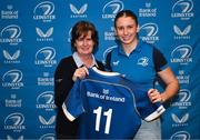 25 November 2023; Clare Gorman is presented with her jersey by Dorothy Collins of Leinster Rugby during the Leinster Rugby Women's Cap presentation after the United Rugby Championship match between Leinster and Munster at the Aviva Stadium in Dublin. Photo by Tyler Miller/Sportsfile