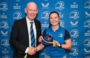 25 November 2023; Sarah Delaney is presented with her cap by Leinster President, Billy Murphy during the Leinster Rugby Women's Cap presentation after the United Rugby Championship match between Leinster and Munster at the Aviva Stadium in Dublin. Photo by Tyler Miller/Sportsfile