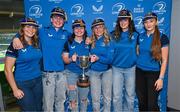 25 November 2023; Newly capped Leinster players, from left, Katelynn Doran, Ruth Campbell, Sarah Delaney, Emma Tilly, Leah Tarpey, and Amy O'Mahony pose for a photograph with their caps during the Leinster Rugby Women's Cap presentation after the United Rugby Championship match between Leinster and Munster at the Aviva Stadium in Dublin. Photo by Tyler Miller/Sportsfile