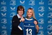 25 November 2023; Aoife Dalton is presented with her jersey by Dorothy Collins of Leinster Rugby during the Leinster Rugby Women's Cap presentation after the United Rugby Championship match between Leinster and Munster at the Aviva Stadium in Dublin. Photo by Tyler Miller/Sportsfile