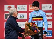 26 November 2023; Sport Ireland Chief Operations Officer, Michael Murray, presents the second place flowers to Arthur Van Den Boer of Belgium after the Mens Junior race during Round 5 of the UCI Cyclocross World Cup at the Sport Ireland Campus in Dublin. Photo by David Fitzgerald/Sportsfile