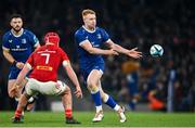25 November 2023; Ciarán Frawley of Leinster in action against John Hodnett of Munster during the United Rugby Championship match between Leinster and Munster at the Aviva Stadium in Dublin. Photo by Sam Barnes/Sportsfile