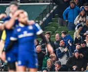 25 November 2023; Leinster supporters celebrate their side's first try during the United Rugby Championship match between Leinster and Munster at the Aviva Stadium in Dublin. Photo by Harry Murphy/Sportsfile