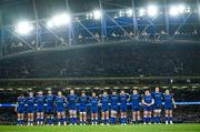 25 November 2023; Leinster players observe a minutes silence before the United Rugby Championship match between Leinster and Munster at the Aviva Stadium in Dublin. Photo by Harry Murphy/Sportsfile