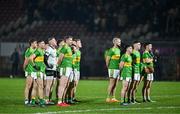 25 November 2023; Glen players stand for Amhrán na bhFiann before the AIB Ulster GAA Football Senior Club Championship semi-final match between Glen, Derry, and Naomh Conaill, Donegal, at Healy Park in Omagh, Tyrone. Photo by Ben McShane/Sportsfile