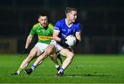 25 November 2023; Eunan Doherty of Naomh Conaill and Cathal Mulholland of Glen during the AIB Ulster GAA Football Senior Club Championship semi-final match between Glen, Derry, and Naomh Conaill, Donegal, at Healy Park in Omagh, Tyrone. Photo by Ben McShane/Sportsfile