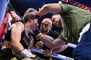 25 November 2023; Katie Taylor with trainer Ross Enamait and cutman Mike Rodriguez during her undisputed super lightweight championship fight with Chantelle Cameron at the 3Arena in Dublin. Photo by Stephen McCarthy/Sportsfile