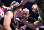 25 November 2023; Katie Taylor with trainer Ross Enamait and cutman Mike Rodriguez during her undisputed super lightweight championship fight with Chantelle Cameron at the 3Arena in Dublin. Photo by Stephen McCarthy/Sportsfile