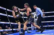 25 November 2023; Chantelle Cameron, right, and Katie Taylor during their undisputed super lightweight championship fight at the 3Arena in Dublin. Photo by Stephen McCarthy/Sportsfile