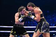 25 November 2023; Chantelle Cameron, right, and Katie Taylor during their undisputed super lightweight championship fight at the 3Arena in Dublin. Photo by Stephen McCarthy/Sportsfile