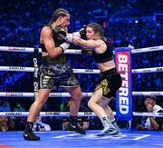 25 November 2023; Katie Taylor, right, and Chantelle Cameron during their undisputed super lightweight championship fight at the 3Arena in Dublin. Photo by Stephen McCarthy/Sportsfile