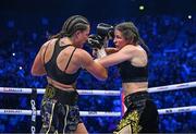 25 November 2023; Katie Taylor, right, and Chantelle Cameron during their undisputed super lightweight championship fight at the 3Arena in Dublin. Photo by Stephen McCarthy/Sportsfile