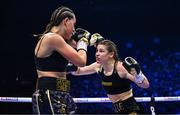 25 November 2023; Katie Taylor, right, and Chantelle Cameron during their undisputed super lightweight championship fight at the 3Arena in Dublin. Photo by Stephen McCarthy/Sportsfile