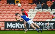 26 November 2023; Lee Brennan of Trillick in action against Damien McArdle of Scotstown during the AIB Ulster GAA Football Senior Club Championship semi-final match between Scotstown, Monaghan, and Trillick, Tyrone, at BOX-IT Athletic Grounds in Armagh. Photo by Ramsey Cardy/Sportsfile