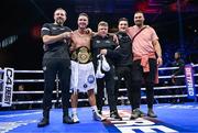 25 November 2023; Paddy Donovan celebrates with his backroom team, including trainer Andy Lee, left, after defeating Danny Ball during their WBA Continental welterweight bout at the 3Arena in Dublin. Photo by Stephen McCarthy/Sportsfile