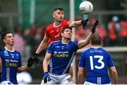 26 November 2023; Darren Hughes of Scotstown in action against Richard Donnelly of Trillick during the AIB Ulster GAA Football Senior Club Championship semi-final match between Scotstown, Monaghan, and Trillick, Tyrone, at BOX-IT Athletic Grounds in Armagh. Photo by Ramsey Cardy/Sportsfile