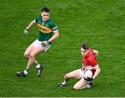 26 November 2023; Matthew Flaherty of Clonmel Commercials in action against Peter McGarry of Dingle during the AIB Munster GAA Football Senior Club Championship semi-final match between Dingle, Kerry, and Clonmel Commercials, Tipperary, at FBD Semple Stadium in Thurles, Tipperary. Photo by Piaras Ó Mídheach/Sportsfile