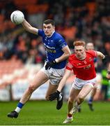 26 November 2023; Michael McCarville of Scotstown in action against Seán O’Donnell of Trillick during the AIB Ulster GAA Football Senior Club Championship semi-final match between Scotstown, Monaghan, and Trillick, Tyrone, at BOX-IT Athletic Grounds in Armagh. Photo by Ramsey Cardy/Sportsfile