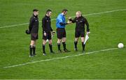 26 November 2023; Standby referee Jonathan Hayes, right, with his fellow match officials, referee John Ryan, linesman Timmy McGrath and sideline official Ciarán Murphy before the AIB Munster GAA Football Senior Club Championship semi-final match between Dingle, Kerry, and Clonmel Commercials, Tipperary, at FBD Semple Stadium in Thurles, Tipperary. Photo by Piaras Ó Mídheach/Sportsfile