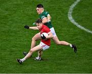 26 November 2023; Matthew Flaherty of Clonmel Commercials in action against Peter McGarry of Dingle during the AIB Munster GAA Football Senior Club Championship semi-final match between Dingle, Kerry, and Clonmel Commercials, Tipperary, at FBD Semple Stadium in Thurles, Tipperary. Photo by Piaras Ó Mídheach/Sportsfile