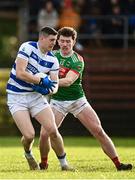 26 November 2023; Rory Maguire of Castlehaven in action against Jason Gleeson of Rathgormack during the AIB Munster GAA Football Senior Club Championship semi-final match between Rathgormack, Waterford, and Castlehaven, Cork, at Fraher Field in Dungarvan, Waterford. Photo by Eóin Noonan/Sportsfile
