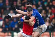 26 November 2023; Richard Donnelly of Trillick in action against Darren Hughes of Scotstown during the AIB Ulster GAA Football Senior Club Championship semi-final match between Scotstown, Monaghan, and Trillick, Tyrone, at BOX-IT Athletic Grounds in Armagh. Photo by Ramsey Cardy/Sportsfile