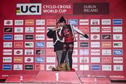 26 November 2023; Minister of State for Sport and Physical Education, Thomas Byrne TD, presents the leader jersey to third place Eli Iserbyt of Belgium after the Elite Mens race during Round 5 of the UCI Cyclocross World Cup at the Sport Ireland Campus in Dublin. Photo by David Fitzgerald/Sportsfile