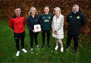 27 November 2023; Republic of Ireland's Katie McCabe presents a defibrillator to Kilnamanagh AFC at their team hotel in Castleknock, Dublin. Pictured with Katie McCabe are, from left, Tony Halpin of Kilnamanagh AFC; Nicola Crofton, Heartsafety Solutions; Mary Gaynor, St Kevin's Family Resource Centre, Kilnamanagh; and Rob DeCourcy, FAI development officer for South Dublin. Photo by Stephen McCarthy/Sportsfile