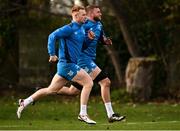 27 November 2023; Ciarán Frawley, left, and Ross Molony during a Leinster Rugby squad training at UCD in Dublin. Photo by Harry Murphy/Sportsfile