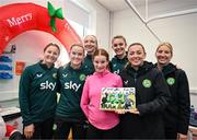 27 Novmeber 2023; Republic of Ireland players, from left, Kyra Carusa, Erin McLaughlin, Louise Quinn, Caitlin Hayes, Katie McCabe and goalkeeper Sophie Whitehouse with Elsie Friel, from Drumkeen, Donegal, a member of the Ireland women's CP team, during a visit to Cappagh Kids and The National Orthopaedic Hospital Cappagh in Dublin to launch the Cappagh Hospital Foundation Christmas Appeal and their fundraising ambassador Boney Maloney. Photo by Stephen McCarthy/Sportsfile