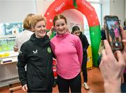 27 Novmeber 2023; Republic of Ireland's interim head coach Eileen Gleeson with Elsie Friel, from Drumkeen, Donegal, a member of the Ireland women's CP team, during a visit to Cappagh Kids and The National Orthopaedic Hospital Cappagh in Dublin to launch the Cappagh Hospital Foundation Christmas Appeal and their fundraising ambassador Boney Maloney. Photo by Stephen McCarthy/Sportsfile