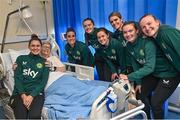 27 Novmeber 2023; Republic of Ireland players, from left, Sinead Farrelly, Chloe Mustaki, Tyler Toland, Heather Payne, Jamie Finn, Saoirse Noonan, and Courtney Brosnan with Margaret Nolan, during a visit to Cappagh Kids and The National Orthopaedic Hospital Cappagh in Dublin to launch the Cappagh Hospital Foundation Christmas Appeal and their fundraising ambassador Boney Maloney. Photo by Ramsey Cardy/Sportsfile